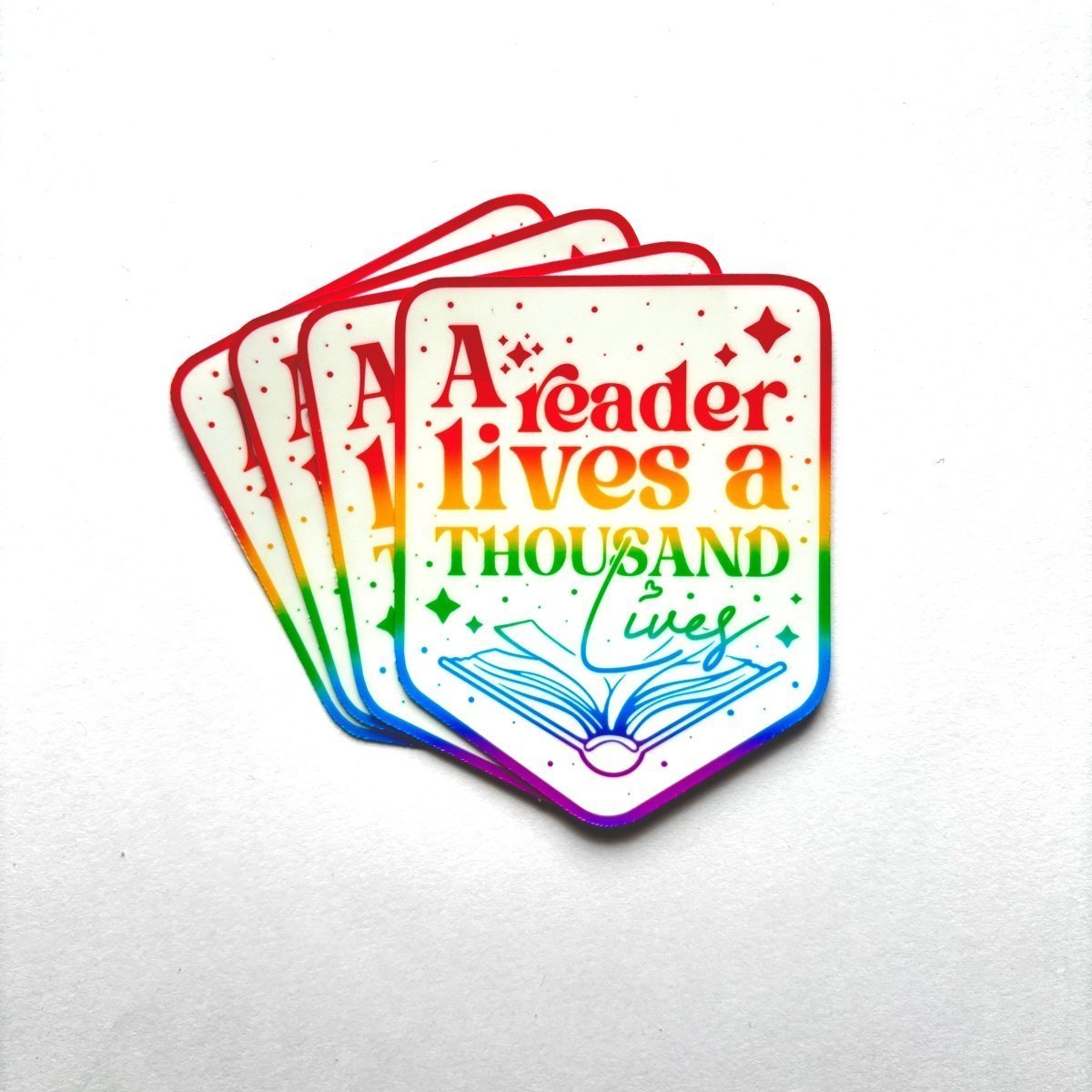 A Reader Lives a Thousand Lives Sticker - Stickiply