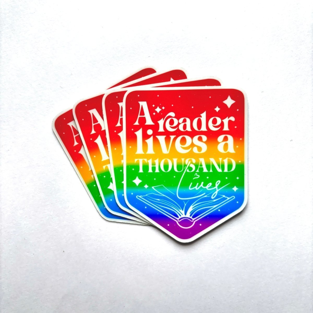 A Reader Lives a Thousand Lives Sticker - Stickiply