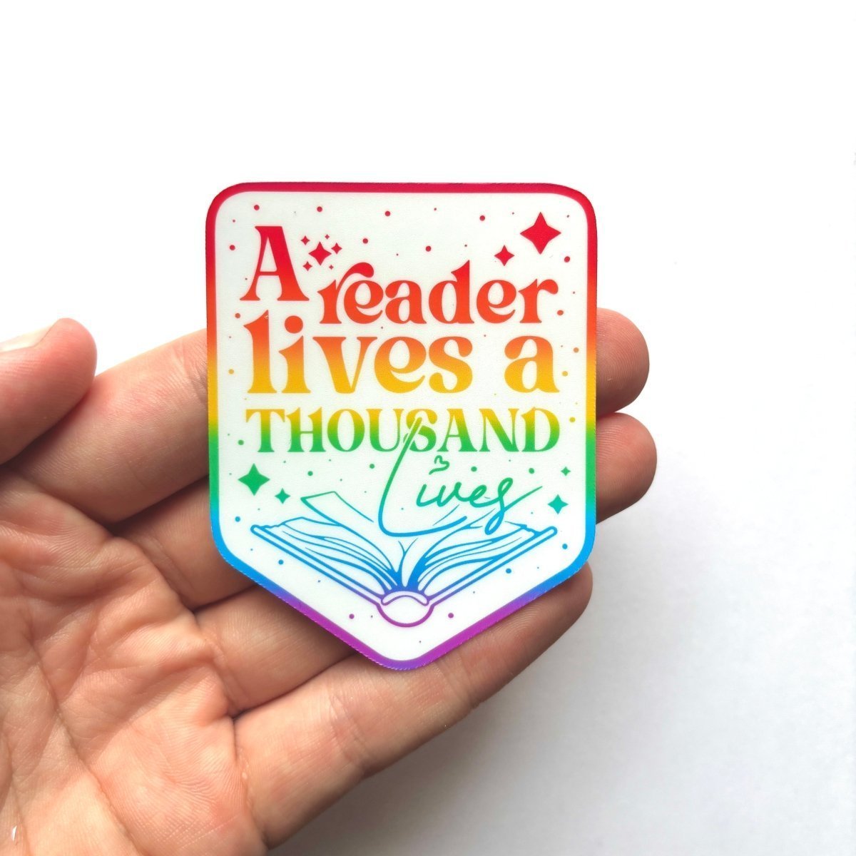 A Reader Lives a Thousand Lives Sticker - Stickiply