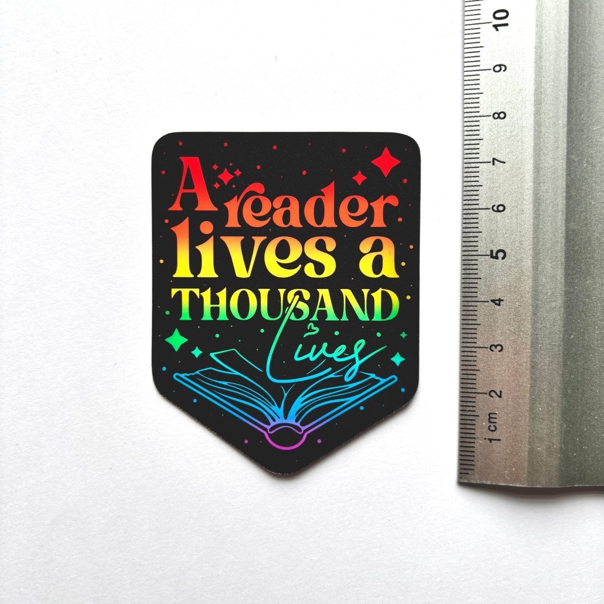 A Reader Lives a Thousand Lives Sticker - Stickiply