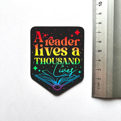 A Reader Lives a Thousand Lives Sticker - Stickiply