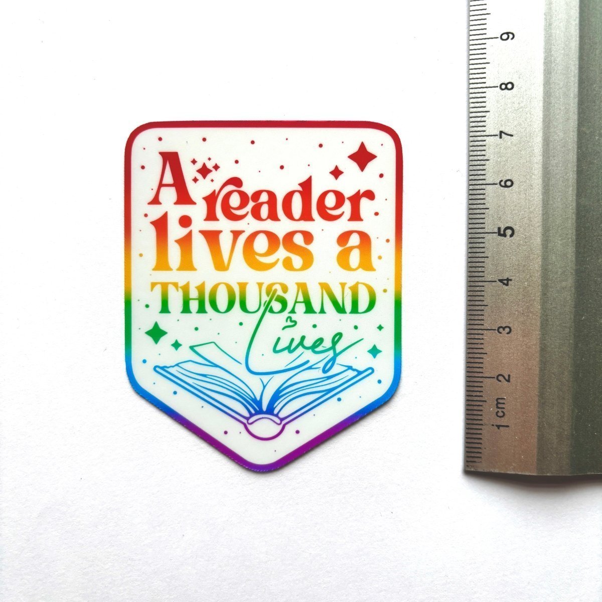 A Reader Lives a Thousand Lives Sticker - Stickiply