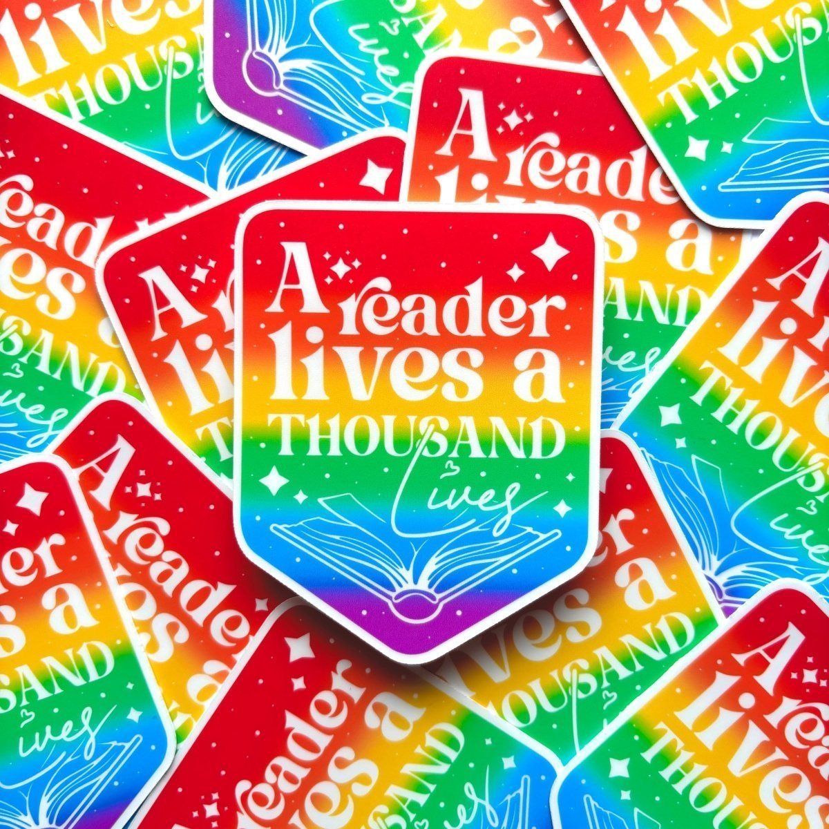 A Reader Lives a Thousand Lives Sticker - Stickiply