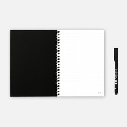 Infinitebook Dotted A5 Black reusable notebook open on a dotted page spread